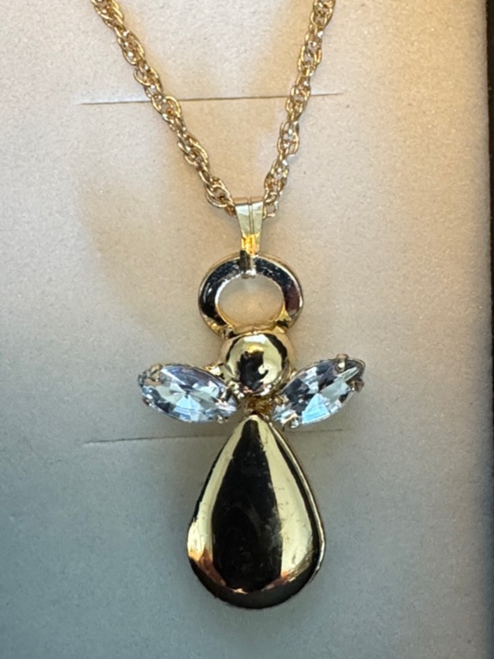 Gold Tone Angel Pendant Necklace with Austrian Crystal Wings. 18” Rope Chain.